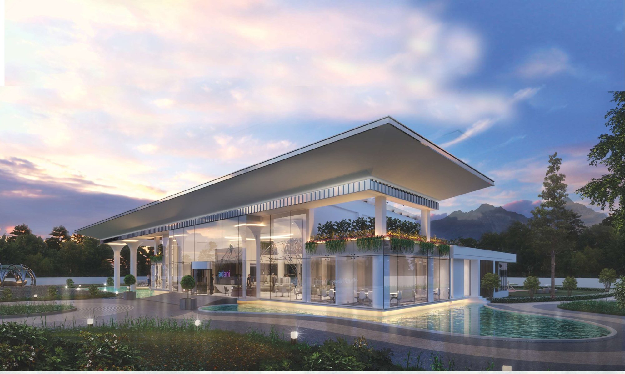 Sales pavilion with a cantilevered roof beside a pool at dusk