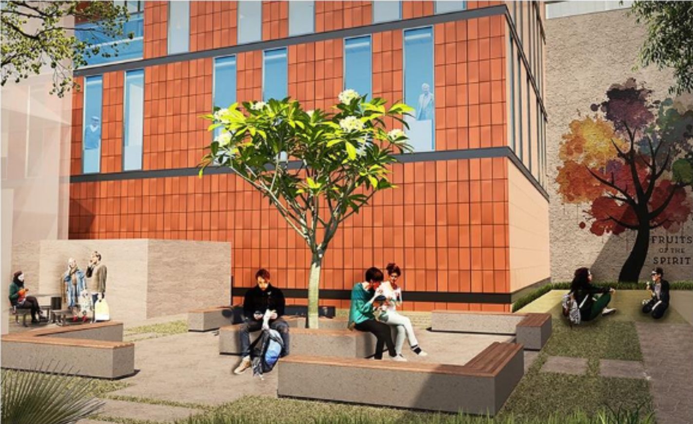 People seated in the landscaped internal court